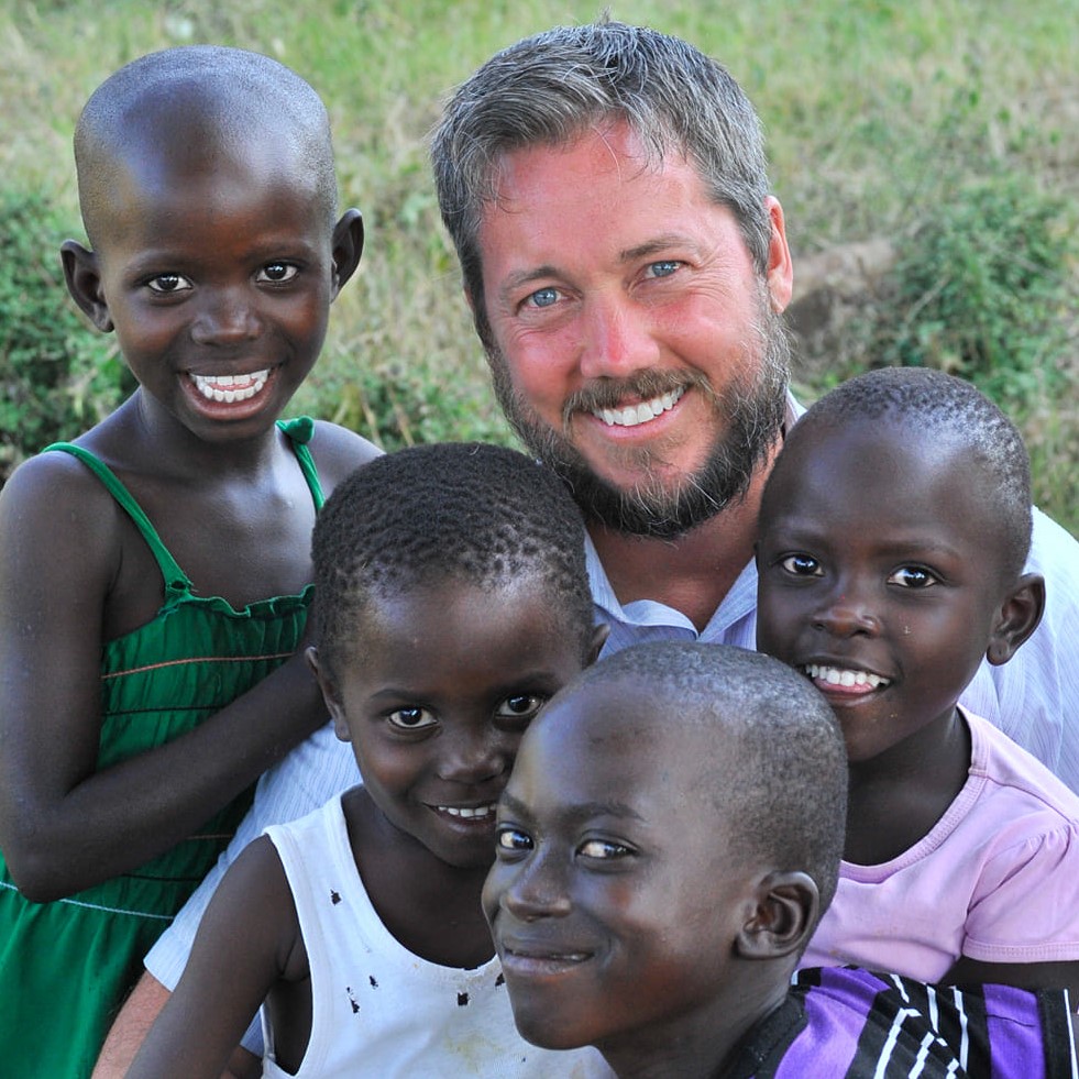 Isaac Heckman with orphans